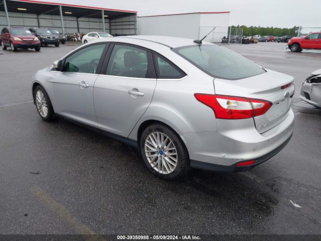 Photo 2 VIN: 1FAHP3H22CL220352 - FORD FOCUS 