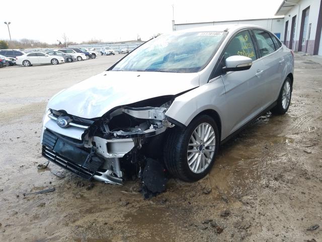 Photo 1 VIN: 1FAHP3H22CL324940 - FORD FOCUS SEL 