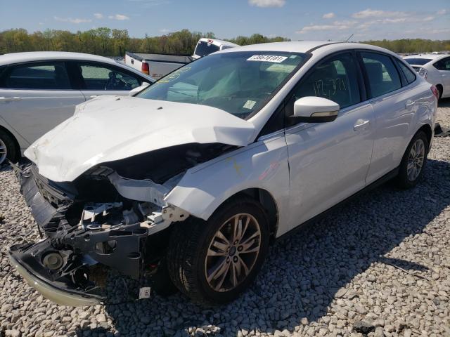 Photo 1 VIN: 1FAHP3H22CL332987 - FORD FOCUS SEL 