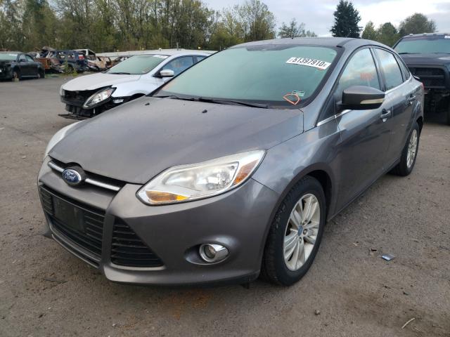 Photo 1 VIN: 1FAHP3H23CL184333 - FORD FOCUS SEL 