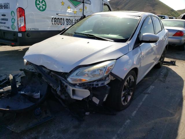 Photo 1 VIN: 1FAHP3H23CL267857 - FORD FOCUS SEL 