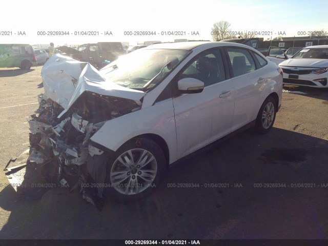 Photo 1 VIN: 1FAHP3H23CL317348 - FORD FOCUS 