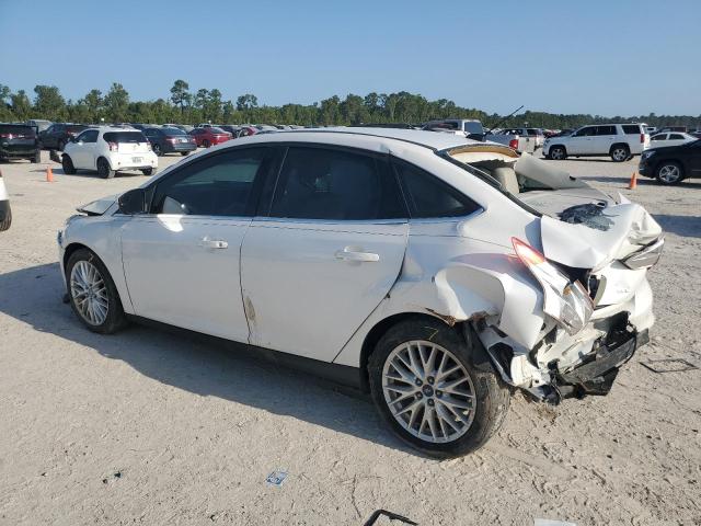 Photo 1 VIN: 1FAHP3H23CL320721 - FORD FOCUS SEL 