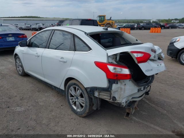 Photo 2 VIN: 1FAHP3H23CL357378 - FORD FOCUS 