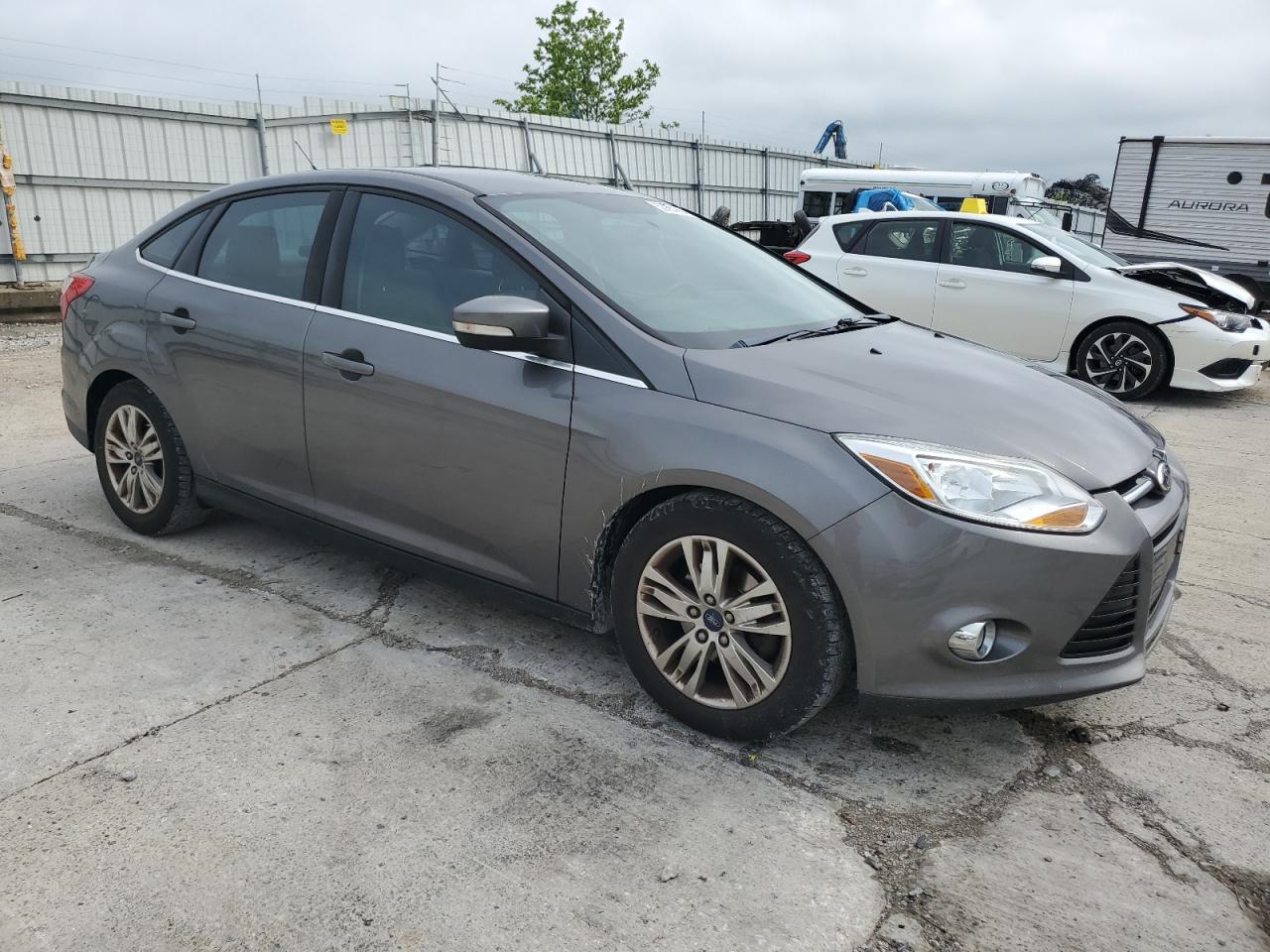 Photo 3 VIN: 1FAHP3H23CL385441 - FORD FOCUS 