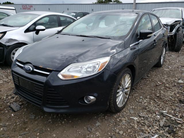 Photo 1 VIN: 1FAHP3H23CL451423 - FORD FOCUS SEL 