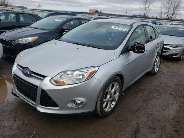 Photo 1 VIN: 1FAHP3H24CL183031 - FORD FOCUS SEL 