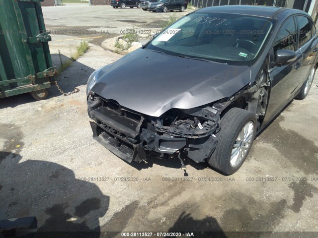 Photo 5 VIN: 1FAHP3H24CL291259 - FORD FOCUS 