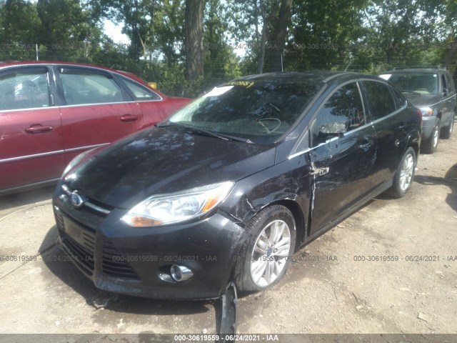 Photo 1 VIN: 1FAHP3H24CL293898 - FORD FOCUS 