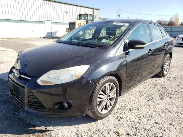 Photo 1 VIN: 1FAHP3H24CL334398 - FORD FOCUS SEL 