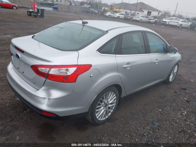 Photo 3 VIN: 1FAHP3H24CL393399 - FORD FOCUS 