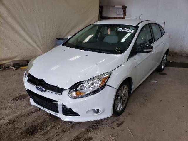 Photo 1 VIN: 1FAHP3H24CL460339 - FORD FOCUS SEL 