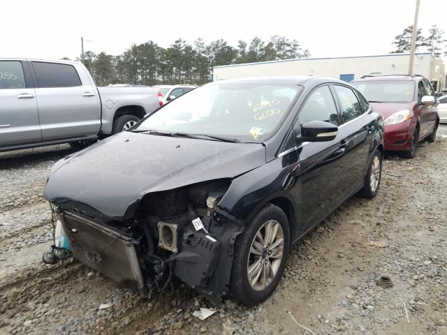 Photo 1 VIN: 1FAHP3H24CL475732 - FORD FOCUS SEL 