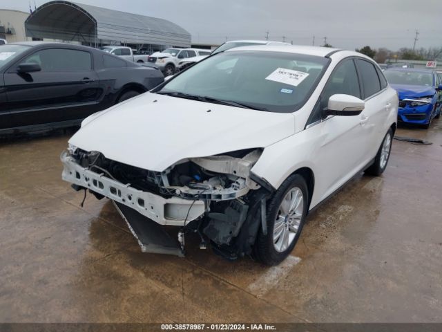 Photo 1 VIN: 1FAHP3H24CL475990 - FORD FOCUS 