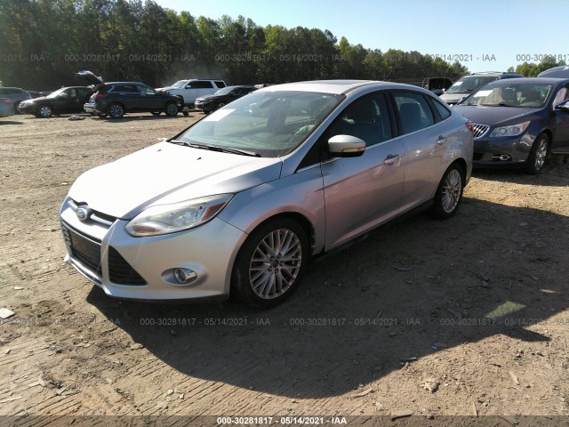 Photo 1 VIN: 1FAHP3H25CL120651 - FORD FOCUS 