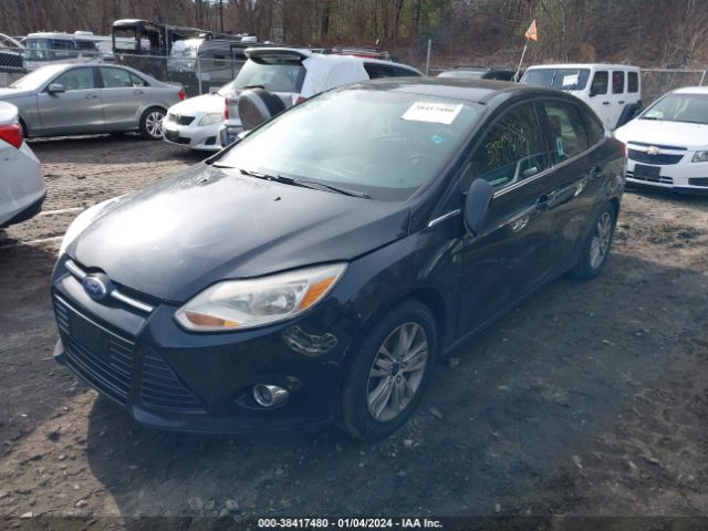 Photo 1 VIN: 1FAHP3H25CL348441 - FORD FOCUS 