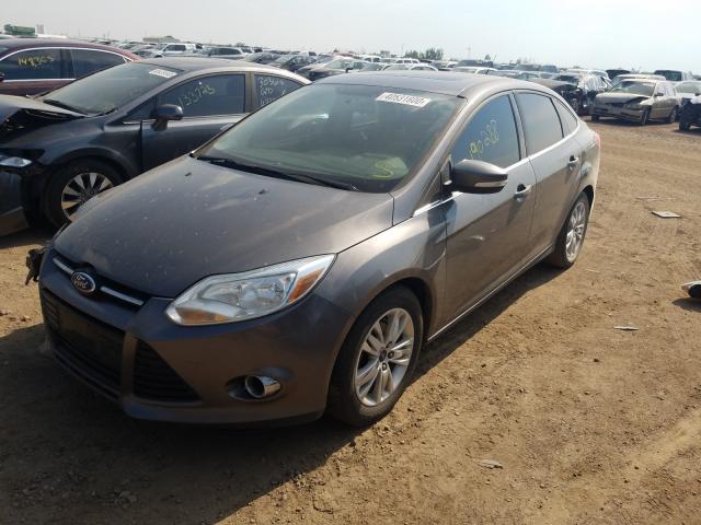 Photo 1 VIN: 1FAHP3H25CL349802 - FORD FOCUS SEL 