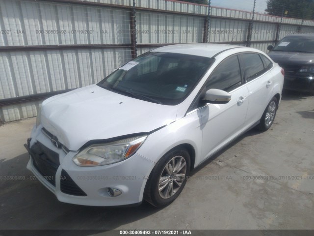 Photo 1 VIN: 1FAHP3H25CL358631 - FORD FOCUS 