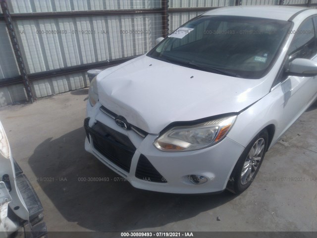 Photo 5 VIN: 1FAHP3H25CL358631 - FORD FOCUS 