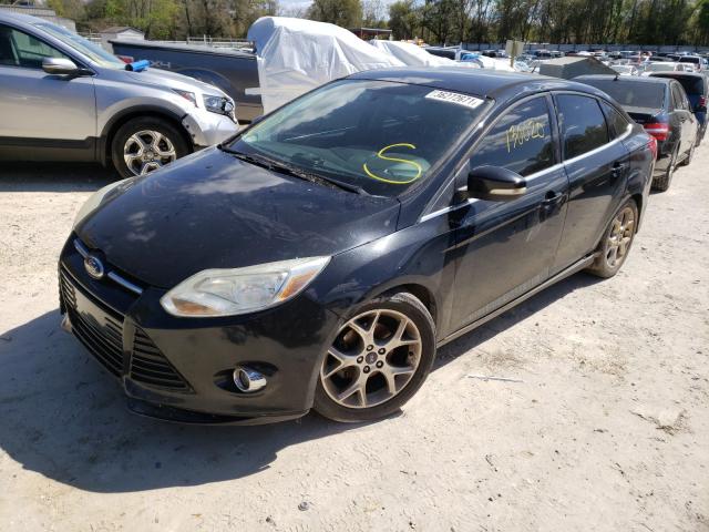 Photo 1 VIN: 1FAHP3H25CL377843 - FORD FOCUS SEL 