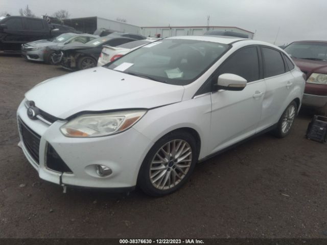 Photo 1 VIN: 1FAHP3H25CL393170 - FORD FOCUS 