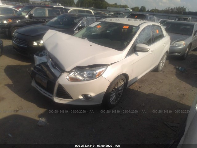 Photo 1 VIN: 1FAHP3H25CL450838 - FORD FOCUS 