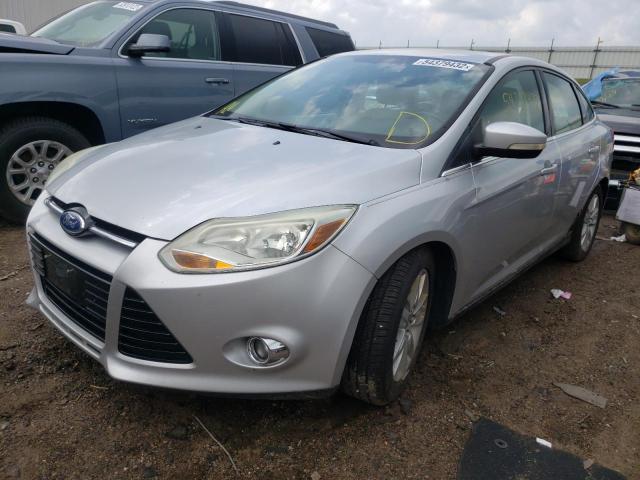 Photo 1 VIN: 1FAHP3H26CL100165 - FORD FOCUS SEL 