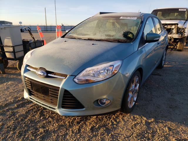 Photo 1 VIN: 1FAHP3H26CL133358 - FORD FOCUS SEL 