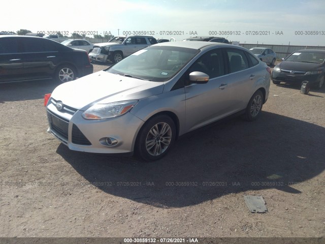 Photo 1 VIN: 1FAHP3H26CL168840 - FORD FOCUS 