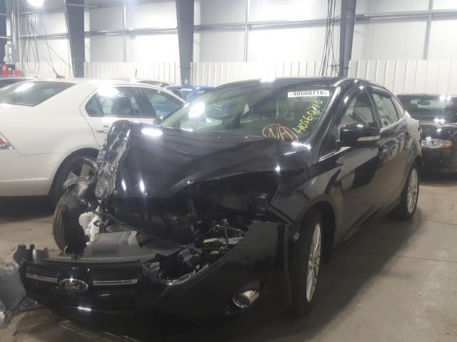 Photo 1 VIN: 1FAHP3H26CL174850 - FORD FOCUS SEL 