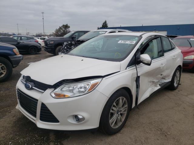 Photo 1 VIN: 1FAHP3H26CL221374 - FORD FOCUS SEL 