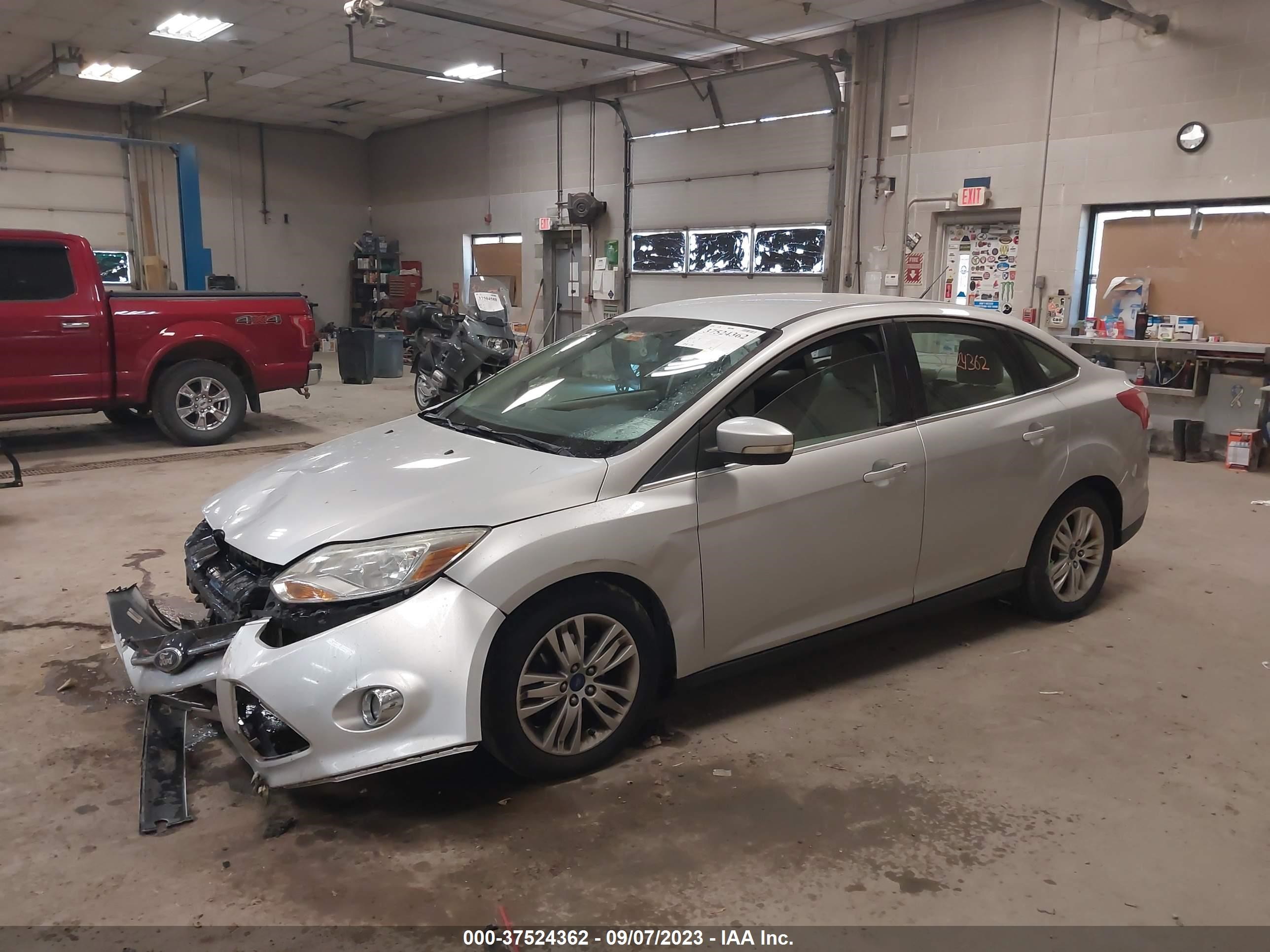 Photo 1 VIN: 1FAHP3H26CL229281 - FORD FOCUS 