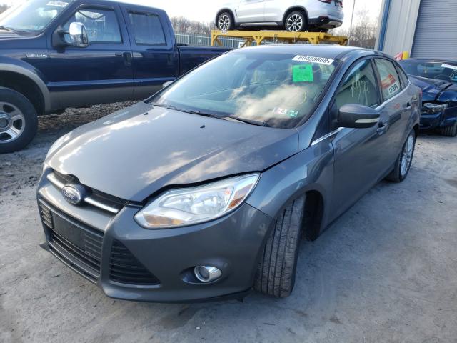 Photo 1 VIN: 1FAHP3H26CL332488 - FORD FOCUS SEL 