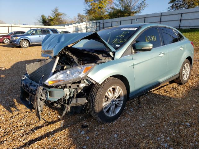 Photo 1 VIN: 1FAHP3H26CL332961 - FORD FOCUS SEL 