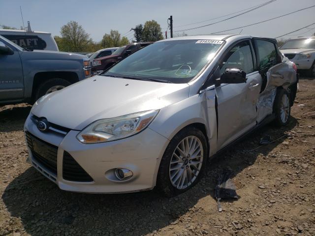 Photo 1 VIN: 1FAHP3H26CL389595 - FORD FOCUS SEL 