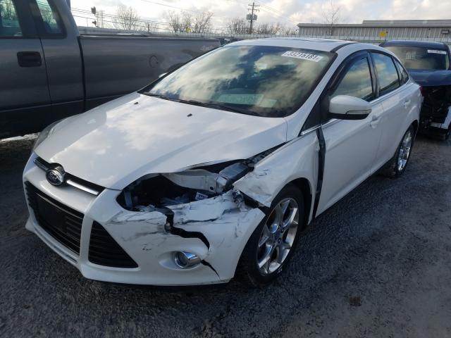 Photo 1 VIN: 1FAHP3H26CL391296 - FORD FOCUS SEL 