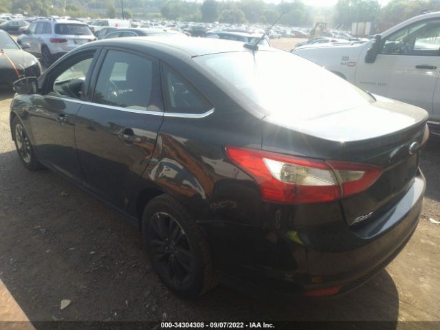 Photo 2 VIN: 1FAHP3H26CL457880 - FORD FOCUS 