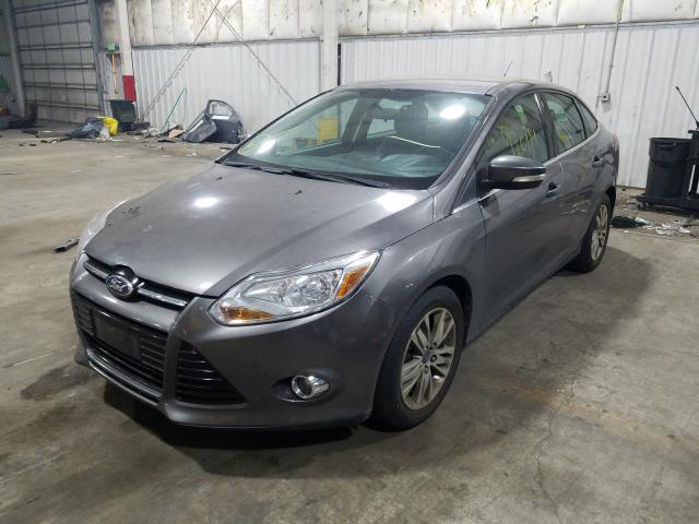 Photo 1 VIN: 1FAHP3H26CL479555 - FORD FOCUS SEL 