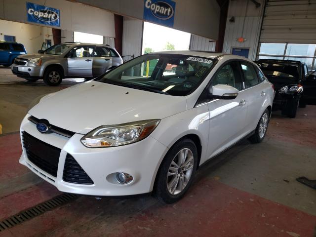 Photo 1 VIN: 1FAHP3H27CL102605 - FORD FOCUS SEL 