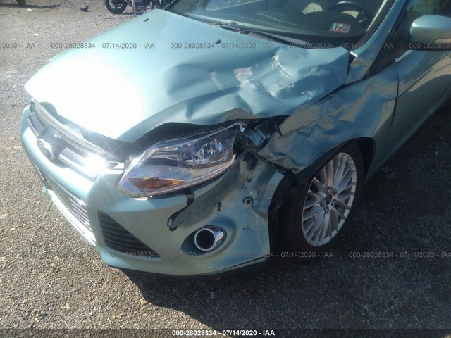 Photo 5 VIN: 1FAHP3H27CL125317 - FORD FOCUS 