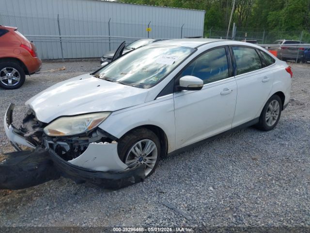 Photo 1 VIN: 1FAHP3H27CL156230 - FORD FOCUS 