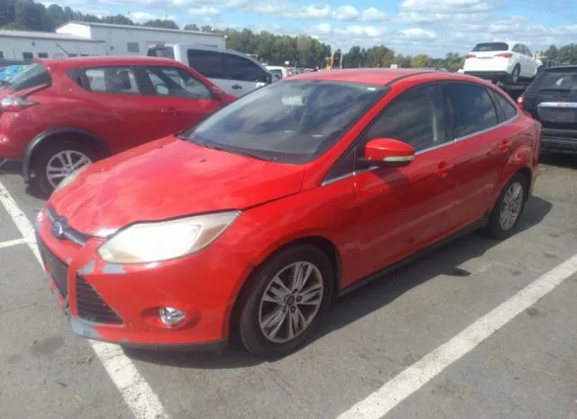 Photo 1 VIN: 1FAHP3H27CL169060 - FORD FOCUS 