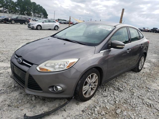 Photo 1 VIN: 1FAHP3H27CL175988 - FORD FOCUS SEL 