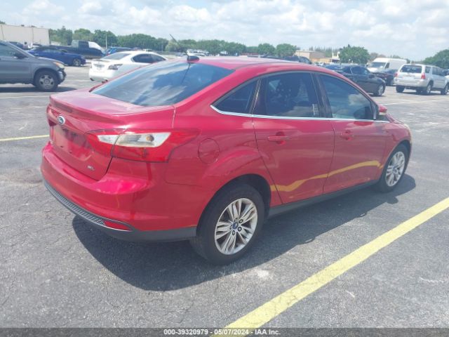 Photo 3 VIN: 1FAHP3H27CL287867 - FORD FOCUS 