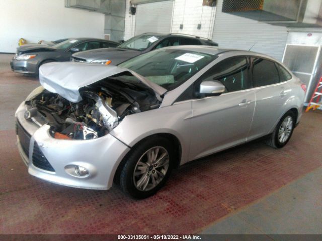 Photo 1 VIN: 1FAHP3H27CL316557 - FORD FOCUS 