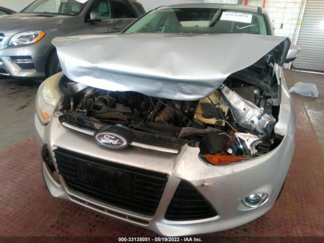 Photo 5 VIN: 1FAHP3H27CL316557 - FORD FOCUS 