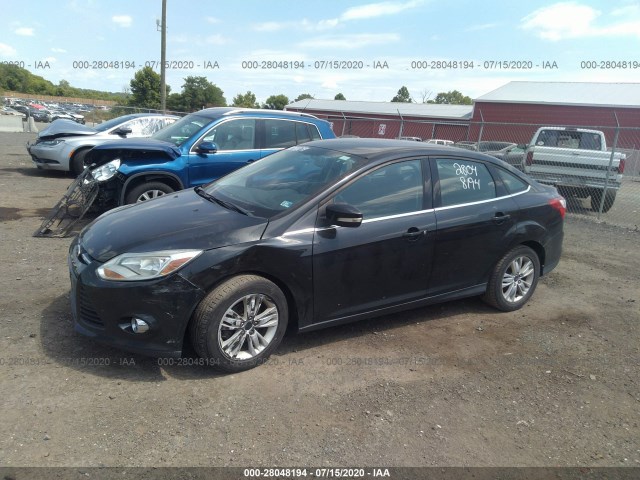 Photo 1 VIN: 1FAHP3H27CL317188 - FORD FOCUS 