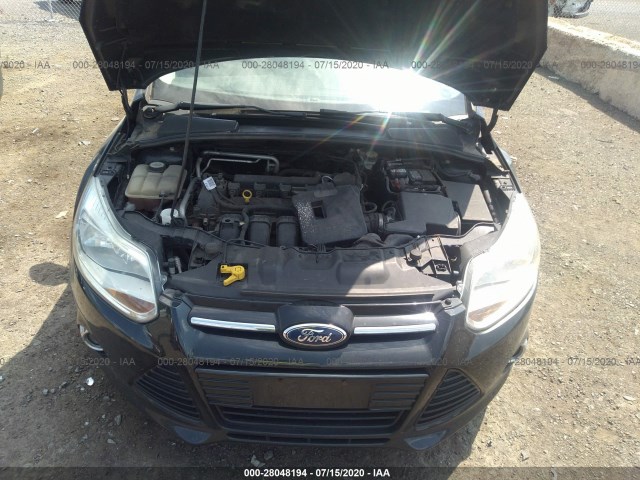 Photo 9 VIN: 1FAHP3H27CL317188 - FORD FOCUS 