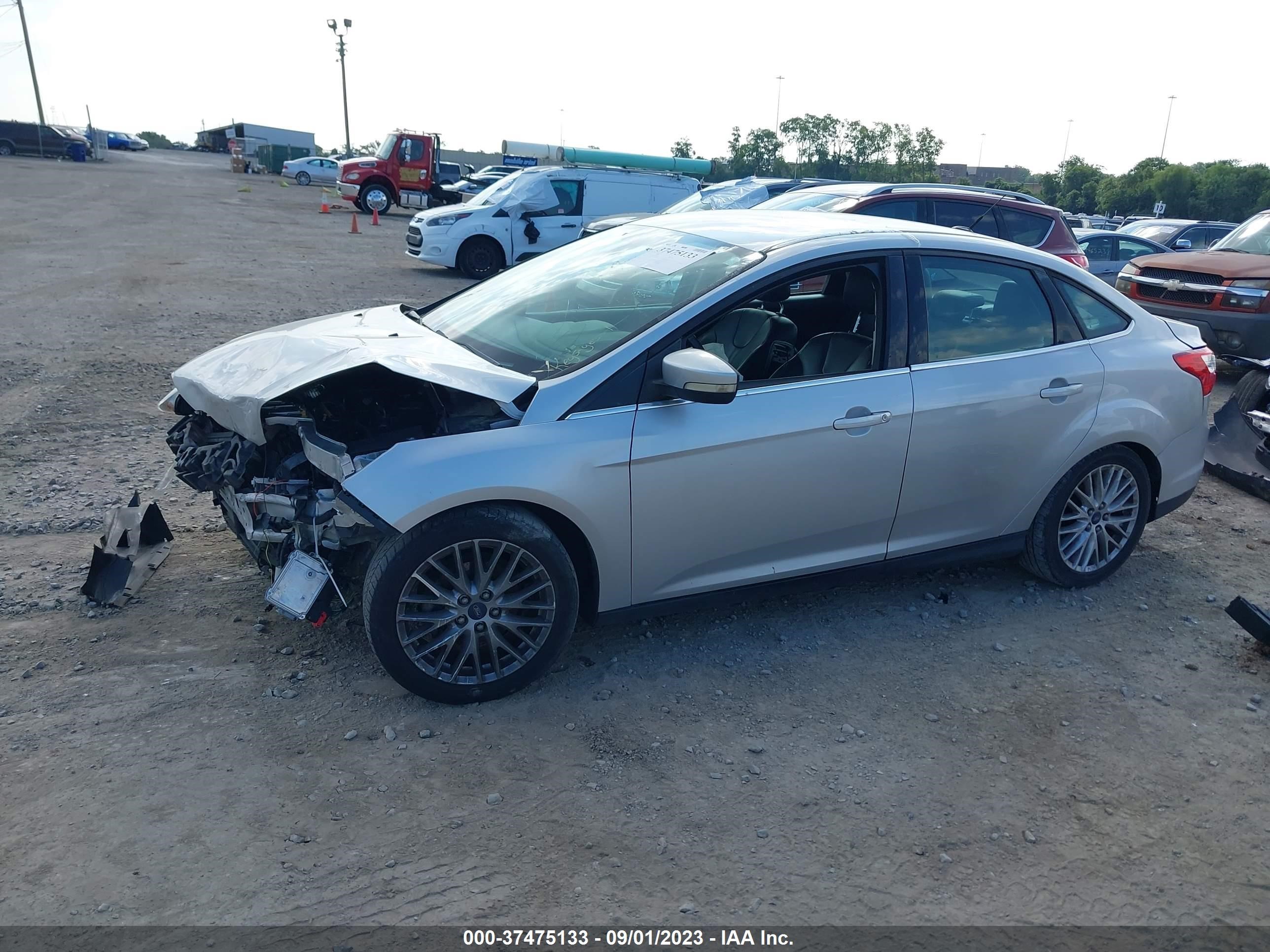 Photo 1 VIN: 1FAHP3H27CL321984 - FORD FOCUS 