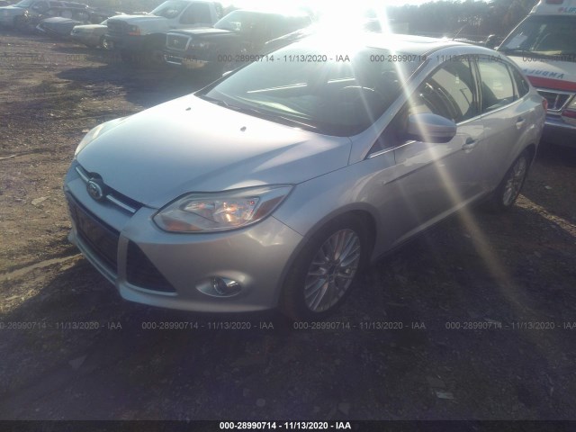 Photo 1 VIN: 1FAHP3H27CL348375 - FORD FOCUS 